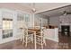 Bright breakfast nook with table and chairs, kitchen view at 4115 Stuart Ln, Indian Land, SC 29707