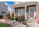 Inviting front porch with rocking chairs and landscaping at 4115 Stuart Ln, Indian Land, SC 29707