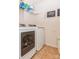 Bright laundry room with washer, dryer, and ample shelving at 4115 Stuart Ln, Indian Land, SC 29707