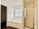 Bathroom with soaking tub and separate shower at 5121 Stone Park Dr, Charlotte, NC 28269