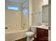 Clean bathroom with tub, toilet and vanity at 5121 Stone Park Dr, Charlotte, NC 28269