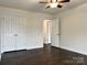 Bedroom with double doors and hardwood floors at 5121 Stone Park Dr, Charlotte, NC 28269