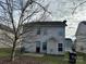 Rear view of a two-story house with a small patio at 5121 Stone Park Dr, Charlotte, NC 28269