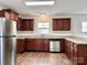 Modern kitchen with granite countertops and wood cabinets at 5121 Stone Park Dr, Charlotte, NC 28269