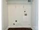 Laundry closet with shelving and hookups for washer/dryer at 5121 Stone Park Dr, Charlotte, NC 28269