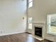 Bright living room featuring a fireplace and hardwood floors at 5121 Stone Park Dr, Charlotte, NC 28269