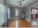 Dining room with hardwood floors and gray walls at 6050 Mcconnells Hwy, McConnells, SC 29726