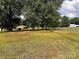 Large grassy yard with mature trees and a view of the road at 6050 Mcconnells Hwy, McConnells, SC 29726