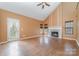 Spacious living room with vaulted ceilings, fireplace, and hardwood floors at 6654 Kingbird Ct, Charlotte, NC 28215