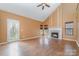 Spacious living room with vaulted ceilings, fireplace, and hardwood floors at 6654 Kingbird Ct, Charlotte, NC 28215