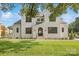 Two-story brick home with a landscaped lawn and inviting front entrance at 669 Dogwood Ln, Davidson, NC 28036