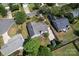 Aerial view of the home showcases a well-maintained property with a backyard patio at 8523 Albury Walk Ln, Charlotte, NC 28277