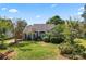 Charming home with a manicured lawn, inviting front porch, and tasteful landscaping at 8523 Albury Walk Ln, Charlotte, NC 28277