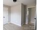 Bedroom features new flooring and fresh neutral paint, plus modern ceiling lighting at 868 Monarch Pl, Kershaw, SC 29067