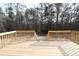 View from the new wooden deck showing the spacious backyard at 868 Monarch Pl, Kershaw, SC 29067