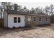 Charming single-story home featuring a combination of brick and siding facade at 868 Monarch Pl, Kershaw, SC 29067