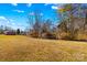 Spacious backyard with mature trees at 111 Lois Ct, Statesville, NC 28625