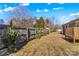 Spacious backyard with wooden fence and deck at 111 Lois Ct, Statesville, NC 28625