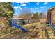 Backyard with playset and wooden deck at 111 Lois Ct, Statesville, NC 28625