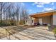 Covered patio area with shed and grassy backyard at 111 Lois Ct, Statesville, NC 28625