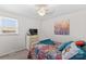 Bright bedroom with double bed, dresser, and large wall art at 111 Lois Ct, Statesville, NC 28625