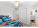 Cozy bedroom with double bed, dresser, and access to bathroom at 111 Lois Ct, Statesville, NC 28625