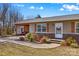 Brick ranch home with updated siding and landscaping at 111 Lois Ct, Statesville, NC 28625