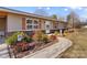 Charming ranch home with walkway and landscaping at 111 Lois Ct, Statesville, NC 28625