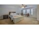 Bright bedroom with two chairs and a toybox at 15127 Alijon Ct, Charlotte, NC 28278