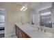 Double vanity bathroom with a walk-in shower at 17627 Caddy Ct, Charlotte, NC 28278