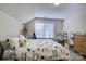 Comfortable bedroom with a bed, a desk and other storage at 17627 Caddy Ct, Charlotte, NC 28278