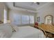 Bright bedroom with large windows, plush bedding, and a dresser at 17627 Caddy Ct, Charlotte, NC 28278