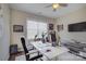 Home office with white desk, comfortable chair, and golf decor at 17627 Caddy Ct, Charlotte, NC 28278