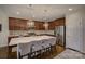 Modern kitchen with large island and stainless steel appliances at 17627 Caddy Ct, Charlotte, NC 28278