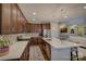 Open concept kitchen with island and stainless steel appliances at 17627 Caddy Ct, Charlotte, NC 28278