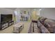 Spacious living area with plenty of natural light and comfortable seating arrangement at 17627 Caddy Ct, Charlotte, NC 28278