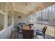 Relaxing screened porch with string lights and patio furniture at 17627 Caddy Ct, Charlotte, NC 28278