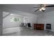 Finished basement offers an open layout with neutral tones and includes lounge seating at 1934 Hickory Hills Dr, Denver, NC 28037