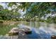 Stunning waterfront view with dock access and tranquil lake scenery, perfect for boating at 1934 Hickory Hills Dr, Denver, NC 28037