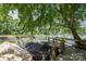 Serene waterfront property showcasing a private dock and beautiful lake views with boats at 1934 Hickory Hills Dr, Denver, NC 28037