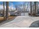 Inviting residence featuring a spacious driveway and a convenient two-car garage at 1934 Hickory Hills Dr, Denver, NC 28037