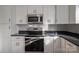 Well-equipped kitchen with stainless steel microwave and oven at 1934 Hickory Hills Dr, Denver, NC 28037