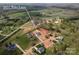 Aerial view showcases the property and surrounding landscape in a tranquil, rural setting at 2657 Polo Ln, Maiden, NC 28650