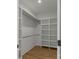 Walk-in closet with custom shelving and ample storage space at 2657 Polo Ln, Maiden, NC 28650