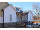 Craftsman style home with white siding, gray roof and brick accents at 2657 Polo Ln, Maiden, NC 28650