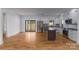 Open floor plan showcases a modern kitchen with stainless steel appliances and a central island at 2657 Polo Ln, Maiden, NC 28650