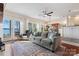 Spacious living room with lake views, fireplace and hardwood floors at 401 Northwest Dr, Davidson, NC 28036