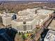 Aerial view of a modern building complex at 4620 Piedmont Row Dr # 606, Charlotte, NC 28210