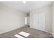 Bedroom with a closet, neutral paint, carpeted floors, and natural light at 7510 Water Oak Ln, Monroe, NC 28110