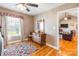 Spacious bedroom with hardwood floors and views of the backyard at 910 Island Ford Rd, Maiden, NC 28650